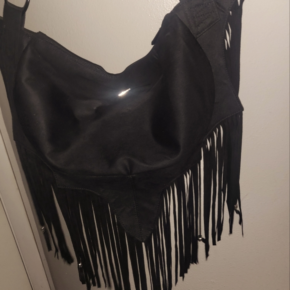 Elvira bat shaped fringe bag.